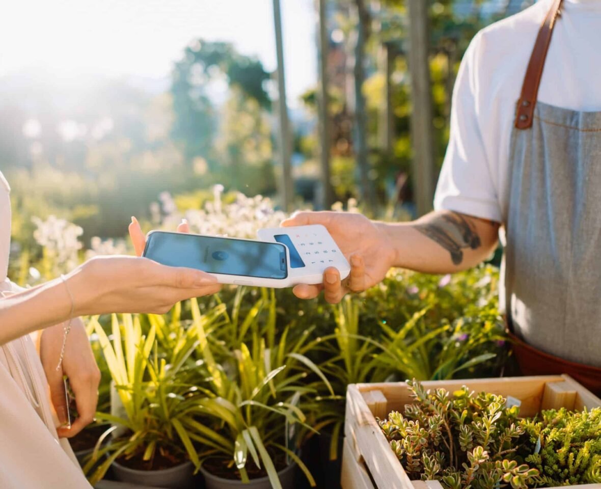 using-handheld-mobile-pos-in-a-gardening-store-2-scaled-1180x960